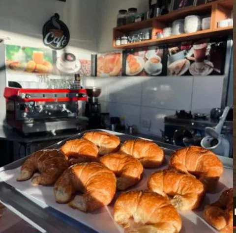 Café con medialunas de El Gauchito